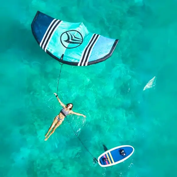 girl wing foiling in Thailand